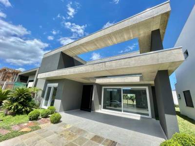Casa em Condomínio 4 dormitórios para venda, Zona Nova em Capão da Canoa | Ref.: 5095