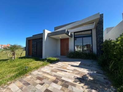 Casa em Condomínio 4 dormitórios para venda, Arroio Teixeira em Capão da Canoa | Ref.: 7783